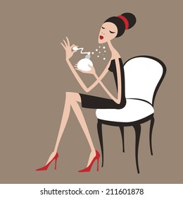 Woman with perfume. Sitting on the chair.
