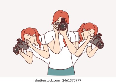 Woman photographer holds professional camera to create photo reports and looks in different directions. Young girl photographer working for magazine or mass media outlet takes pictures.