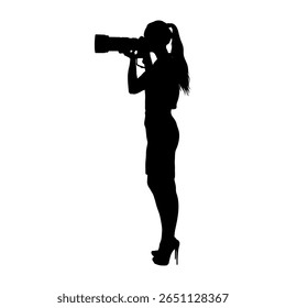 Woman photographer standing holding camera taking photos side view black silhouette isolated on white background.	