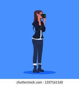 woman photographer taking picture with camera female journalist reporter shooting professional occupation concept cartoon character full length flat blue background