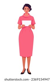 A woman in a pink business dress stands holding a white sheet of paper in her hands