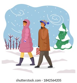 Woman in pink down jacket with hood, man in warm jacket, hat, with paper gift bag. Winter time, blizzard, snow, icy spruce. Married couple visiting on New Year's holiday. Snowflakes, winter sky