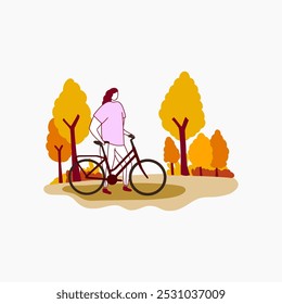 Uma mulher de camisa rosa está ao lado de sua bicicleta em um parque de outono.