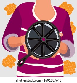 Woman in pink t-shirt show in her hand waffle iron for prepared waffles isolated on light background. Stock vector cute illustration of waffle cooker in flat cartoon style.