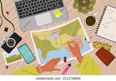 Woman plan a trip. Travel concept top view vector illustration. Table with map, passport, camera and laptop. Female hand draw trip route on a world map. Holiday adventure, vacation, travel checklist