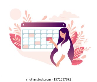 A woman is planning a medical appointment with a doctor on a calendar. 