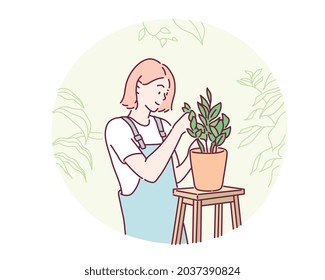 Woman planting flowers. Hand drawn style vector design illustrations.