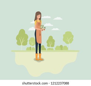 woman planting tree in the park