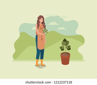 woman planting tree in the park