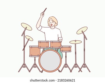 woman playing drums, drummer. Hand drawn style vector design illustrations.