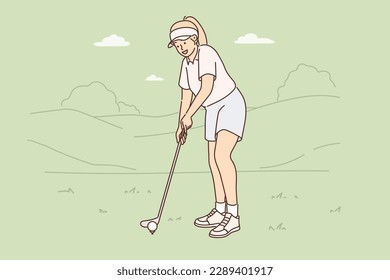 Woman is playing golf on green lawn preparing to hit with club to put ball into hole. Girl participates in professional golf tournament and wants to win or become champion in competition. 