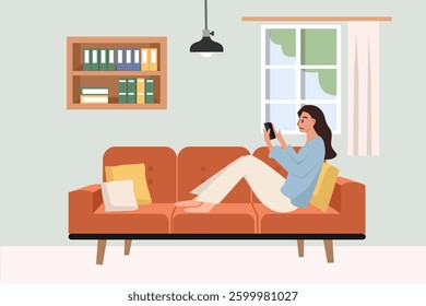Woman playing smartphone. Woman playing game. Video call. Girl in the living room. Cozy sofa. Bookshelf. Window. 