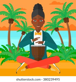 Woman playing tomtom.