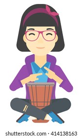 Woman playing tomtom.