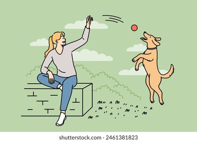 Woman plays with dog in park, tossing ball to bouncing puppy and enjoying perfect sunny weather. Energetic dog enjoys walk with owner, who adopted pet from shelter because of kindness to animals.