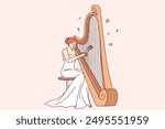 Woman plays large harp, performing at symphony concert or classical music festival. Harp with strings near female musician organizing acoustic music show for connoisseurs of opera performances