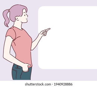 Woman pointing finger at copy space. Hand drawn in thin line style, vector illustrations.