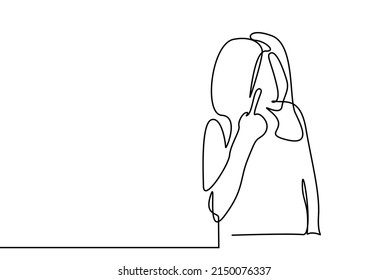 a woman points to her eye