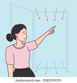 A woman points towards an open window, encouraging proper air circulation for fresh air and better health.