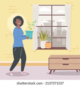 woman with potted plants in room