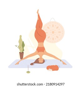 A woman practices yoga headstand balance at home next to a sleeping cat. Vector cartoon illustration of girl and mandala, trendy flat style.