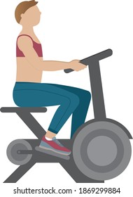 Woman practicing in exercise bicycle