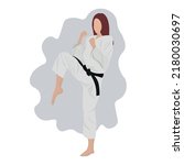 Woman practicing karate on white background