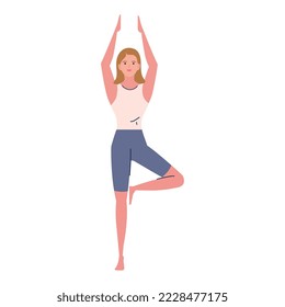woman practicing yoga in position of tree