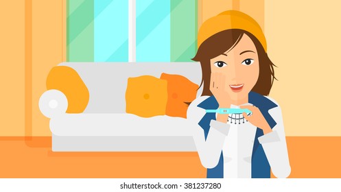 Mujer con prueba de embarazo.