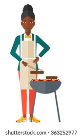 Woman preparing barbecue.