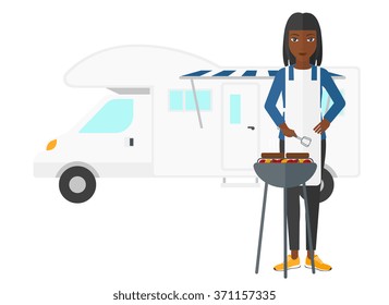 Woman preparing barbecue.