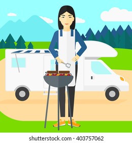 Woman preparing barbecue.