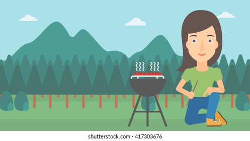 Frauen, die Grillgerichte zubereiten.