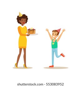 Woman Presenting A Cake To A Boy, Kids Birthday Party Scene With Cartoon Smiling Character