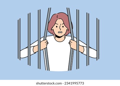 Woman prisoner breaks bars wanting to be released from captivity, for concept fight against discrimination and restrictions. Girl prisoner trying to escape from prison to avoid punishment for crimes