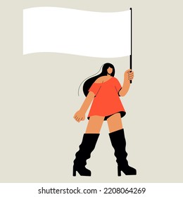 A woman at a protest. A girl in a dress with a flag at a rally demands equality. White flag in hand