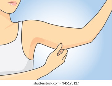 Woman pull skin upper arm area for checking her arm size.