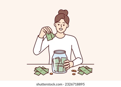 Woman puts money in jar wanting to save up to buy own house or start successful business for financial literacy concept. Girl saves money for retirement, not trusting banks and investment funds