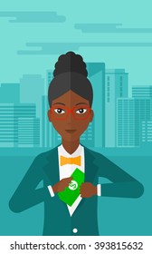 Woman putting money in pocket.