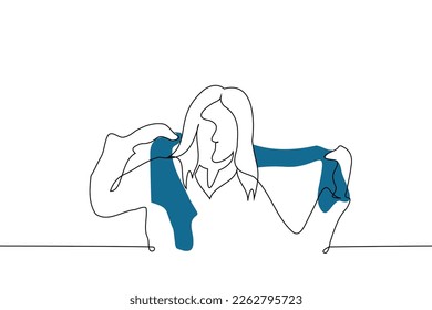 mujer poniendo la bufanda alrededor de su cuello - un vector de dibujo de una línea. concepto a engrosar, vestir calurosamente en otoño e invierno