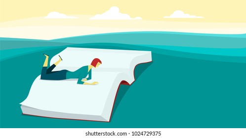 The woman reading a big book on green sward.