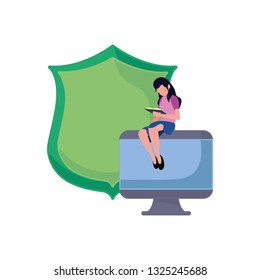 woman reading book on monitor shield