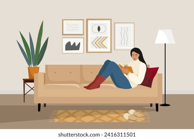 A woman is reading a book on the sofa. Free time with a book. Vector illustration.