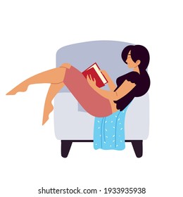 woman reading book sitting chair