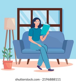woman reading book in sofa