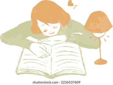 Una mujer leyendo un libro mientras está tumbada en el estómago