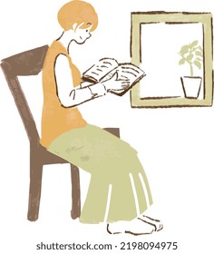 woman reading by the window