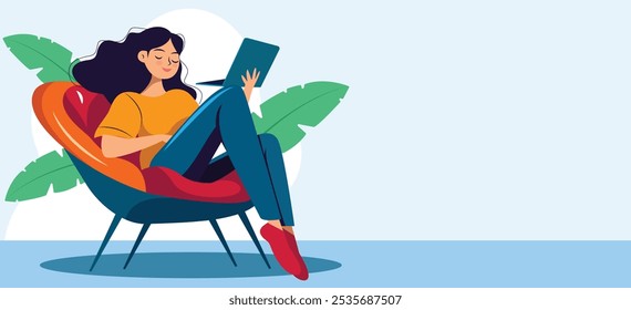 Woman reading a tablet in a lounge chair