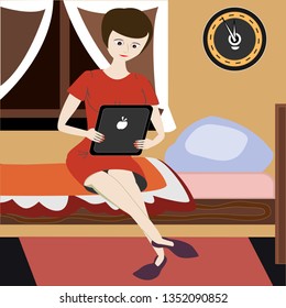 Woman reads from tablet in a bedroom. Girl holds tablet computer sitting on a bed in tender colors interior. Education or leisure reading before going sleep. Social or online networking in late night