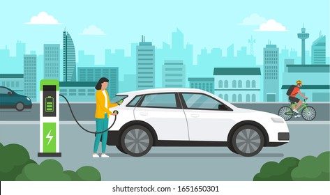 Woman recharging her electric car at the station and city in the background, automotive technology concept